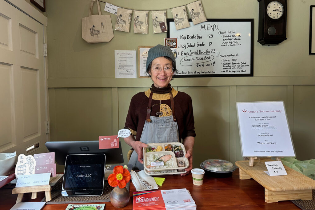 Mariko Grady poses inside Aeden Fermented Foods' Koji Kitchen, on the list of Asian-owned storefronts to visit