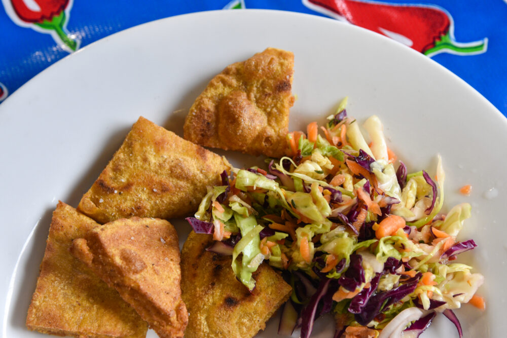 A plate of Curtido and Tortillas Salvadoreñas