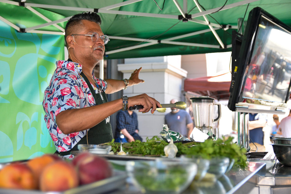 Chef Rick Martinez teaching a cooking demo at the Foodwise Classroom